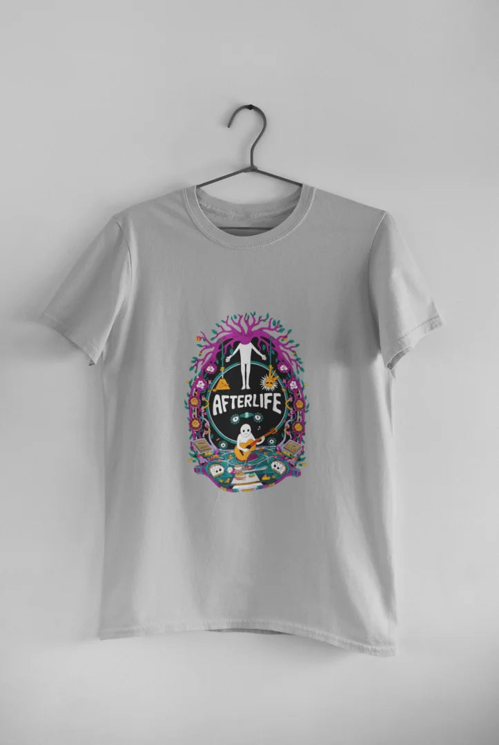 Grey graphic print T-shirt hanging on a black hanger against a plain white background, featuring a psychedelic design reading Afterlife with a colorful, whimsical illustration of various shapes and colors, and a white silhouette of a person with arms outstretched in the center.