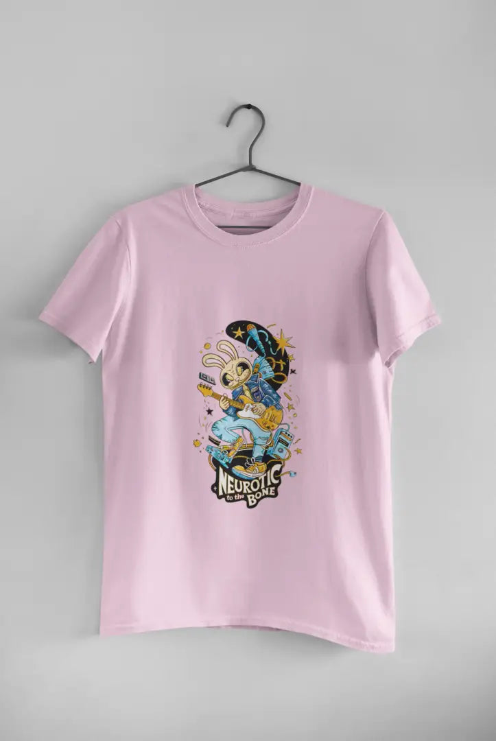 Pink band T-shirt hanging on a black hanger against a plain white background, featuring a colorful illustration of a cartoon character playing a guitar. The design has text Neurotic To The Bone in yellow letters, with stars and a crescent moon above the character in a playful design.
