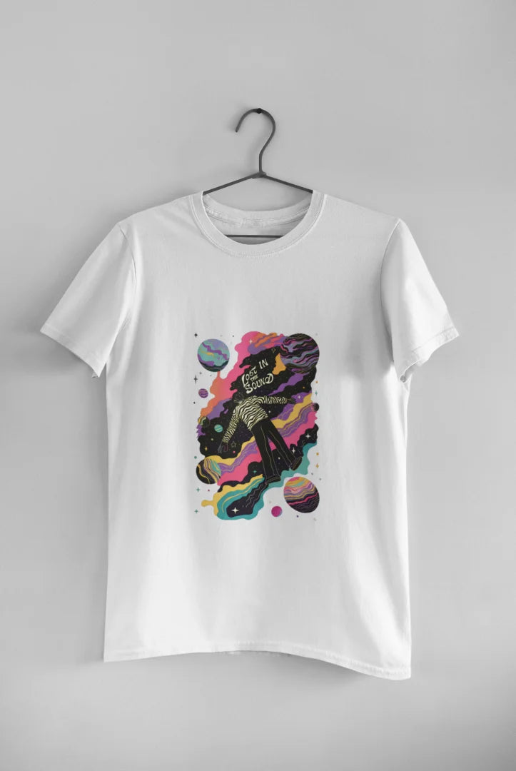 White tee shirt with a cosmic design featuring a person in a black and white striped shirt floating in space.