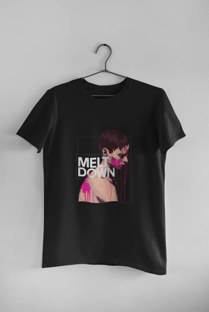 A black t-shirt featuring a stylized portrait of a pensive young man with pink drips on his bare chest. Bold white text reads “MELT DOWN” within a dark gray rectangular frame. The design is graphic and dramatic.