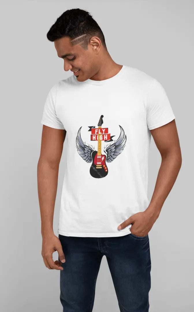 A man standing in a pose wearing a white T-shirt with the design of a guitar having wings. There’s a text saying Fly High.