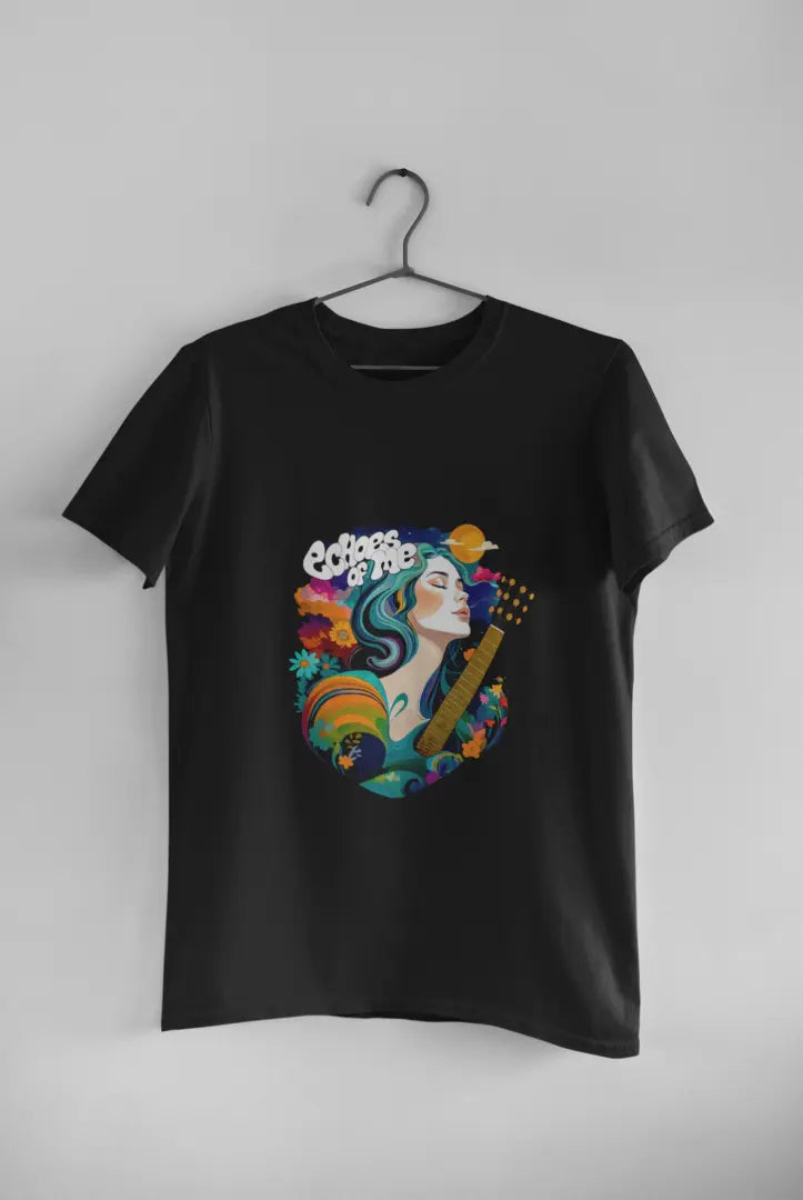 A black T-shirt hanging against a grey background consisting of a psychedelic design of a girl holding a guitar. There’s a text saying echoes of me.