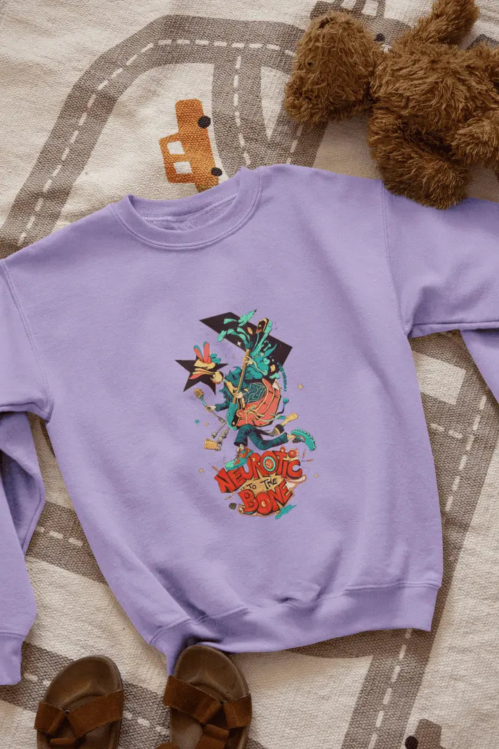 A lavender sweatshirt with a printed design lying on the floor. The design contains of a funky character with an instrument and a microphone in his hand. There’s a text saying “Neurotic to the bone”.