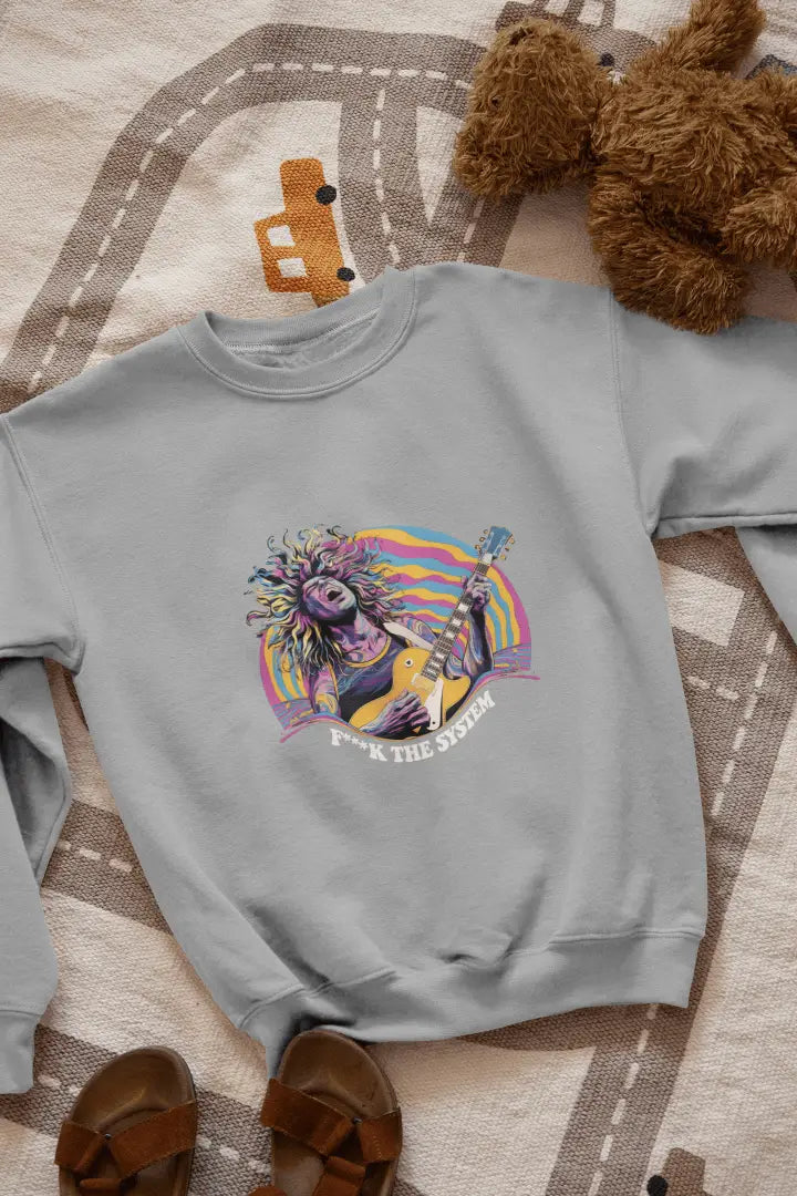 A grey sweatshirt featuring a bold graphic of a light-skinned man with vibrant, colorful hair playing an electric guitar in a retro, energetic, psychedelic style. Vibrant hues of pink, purple, yellow, and teal create a psychedelic vibe. The text “F**K THE SYSTEM” appears prominently below the design.