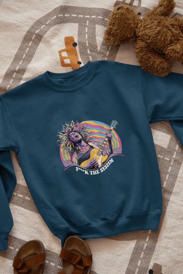 A navy blue sweatshirt featuring a bold graphic of a light-skinned man with vibrant, colorful hair playing an electric guitar in a retro, energetic, psychedelic style. Vibrant hues of pink, purple, yellow, and teal create a psychedelic vibe. The text “F**K THE SYSTEM” appears prominently below the design.