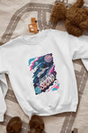 A printed white sweatshirt lying on the floor with the design of a man floating in space. There’s a text saying Lost in the Sound.