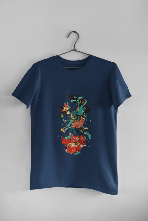 A navy blue printed t-shirt hanging against a light grey wall. The t-shirt design consists of a character with a microphone in his hand. There's a text saying Neurotic To the Bone at the bottom of the design.