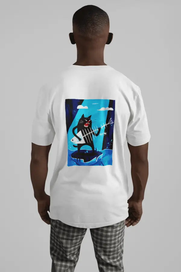 A man wearing a white oversized t-shirt with a design printed on the back. The design contains a cat holding a fish bone like a guitar and appearing to play it aggressively. There's a text saying Solo Time on the right side of the design.
